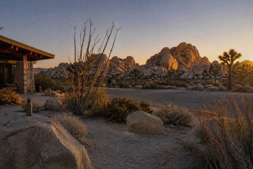 Golden evening light on boulder formations at a roadside viewpoint